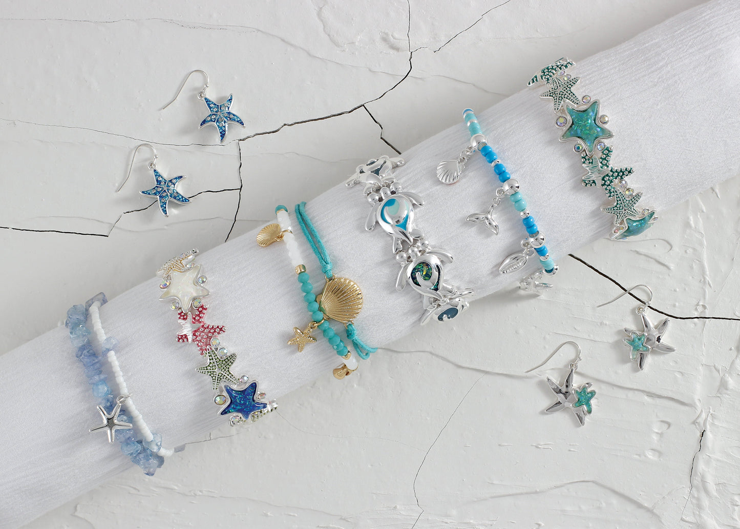 Periwinkle Multi Row Leather, Crystal And Iridescent Bands With Beautifully Done Crystal Starfish Bracelet